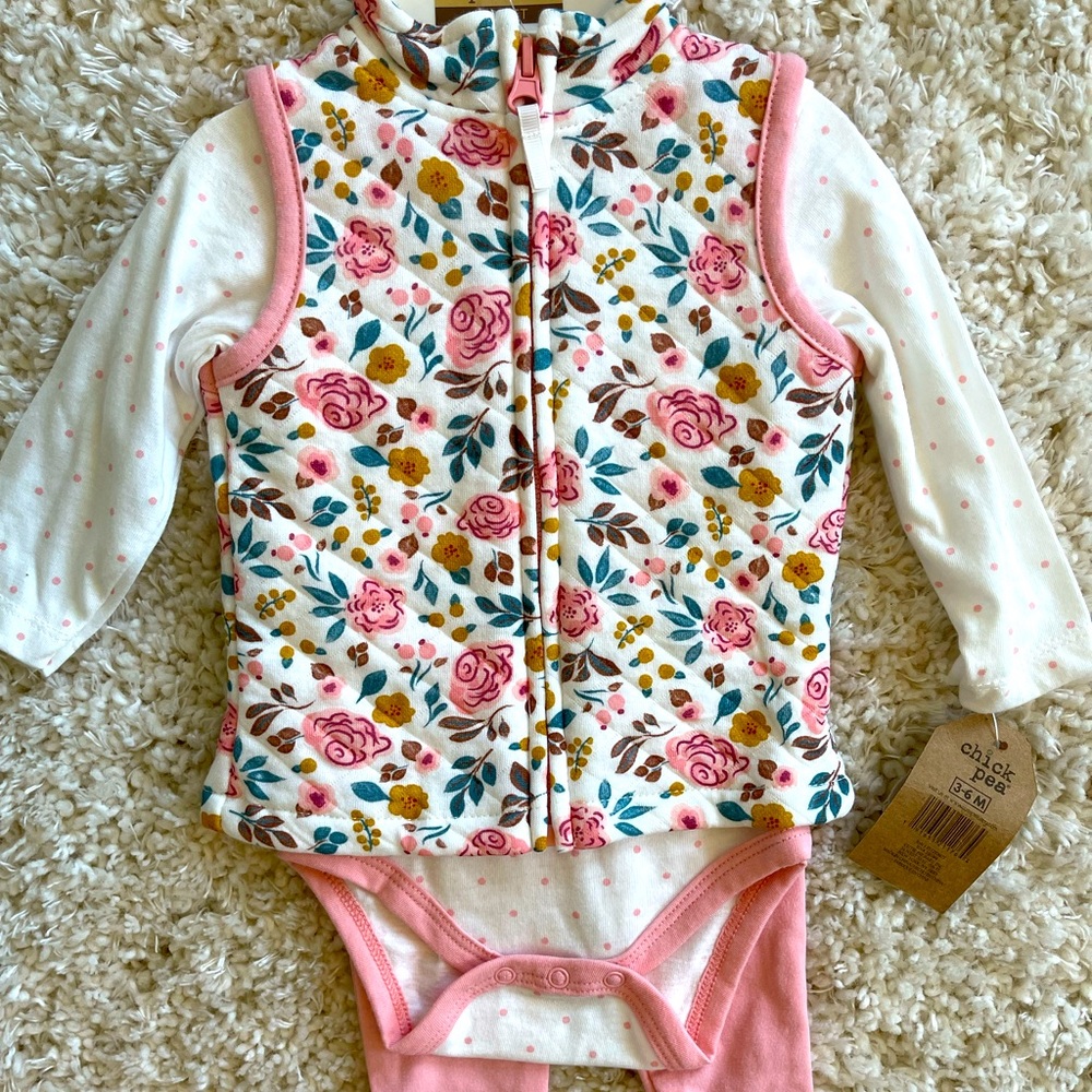 Floral vest, long sleeve onesie, and pants included